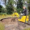 Trampoline Installation -Digger (3) Trampoline Installation Service Flat to the ground